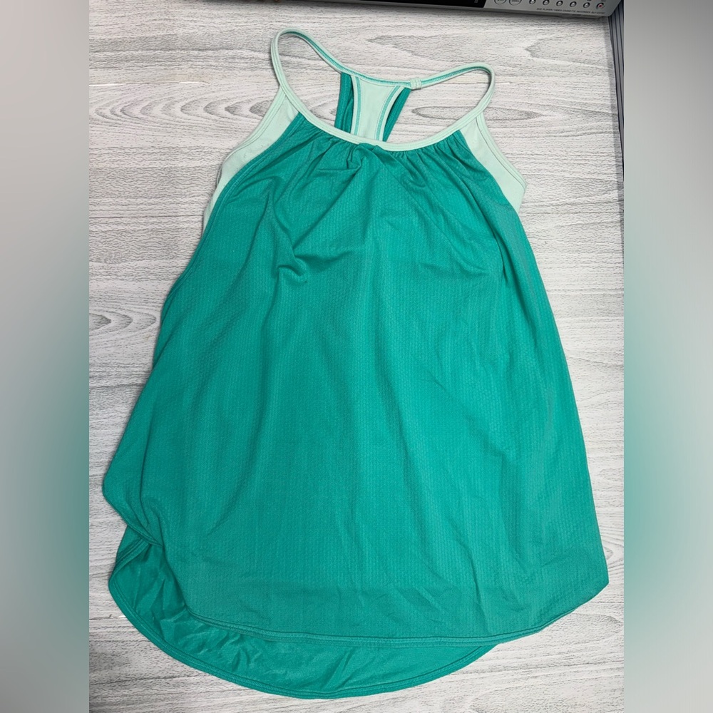 Lululemon Tank Top- Women’s Size 4- Turquoise Green. In very good condition.